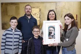 Farragh McGeary (age 13) from St. Patrick's Academy, Dungannon, is a winner in this year's 69th Texaco Children's Art Competition. She is pictured with her prize-winning work entitled ‘Don’t Tell Mom’ with her brother Dáithí (11), father Brian, brother Emmet (6) and mother Eimear.The picture was taken at a function to announce the top winners held in Dublin.