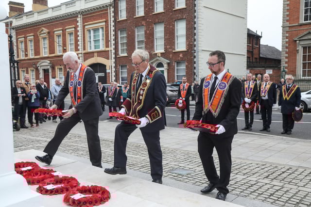 Laying wreaths at the Lisburn War Memorial