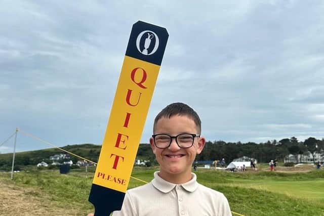Zane with one of the official 'Quiet' paddles used during The Open at Portrush. CREDIT LINDA ATTIA
