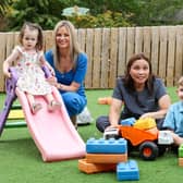 Celebrating Clear Day Nurseries’ prestigious UK industry awards for its childcare facilities are Sienna McLoughlin (2) and mum Nicole, Evelyn Verschuur, pre-school room leader and Daire O’Connor (4), at Kids@BT9 Daycare in Belfast. Credit: Matt Mackey
