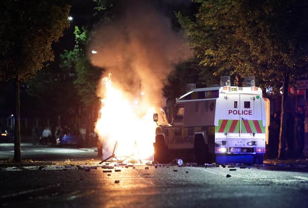 The Chief Constable's letter was sent in the wake of several nights in which police came under attack in Belfast after anti-immigration protests. Photo by Kelvin Boyes / Press Eye.