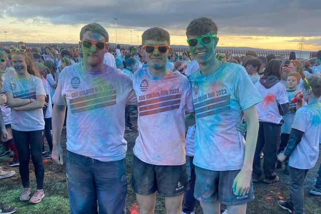Posing for a photograph after taking part in the colour run.