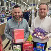 (L-R) MLAs Timothy Gaston and Colin Crawford promote the 12th annual Tesco Winter Food Collection in Ballymena.