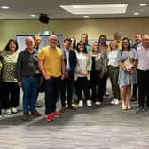 Pictured are successful Alliance councillors with David Honeyford MLA and supporters.