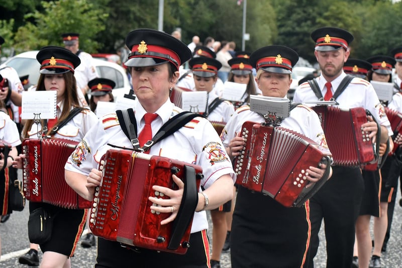 Members of Mavemacullen Accordion Band on their 'lap of honour' during their 70th anniversary parade in Markethill on Wednesday. PT32-239.