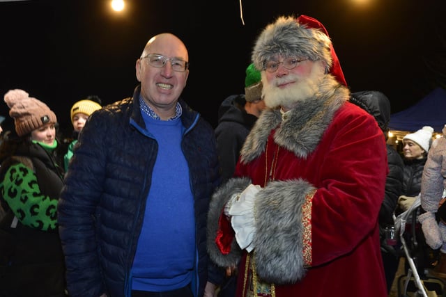Councillor John Laverty BEM with Santa at the Carryduff Christmas Market