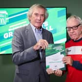 Tom McKenna receiving his award from Pat Jennings. Pic credit: Darren Kidd