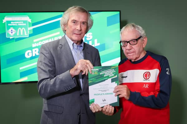 Tom McKenna receiving his award from Pat Jennings. Pic credit: Darren Kidd