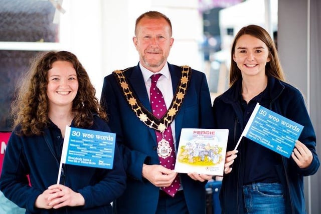 Jacqueline Purse and Gail McCullough welcome the Mayor to the Ulster Scots Agency stall.