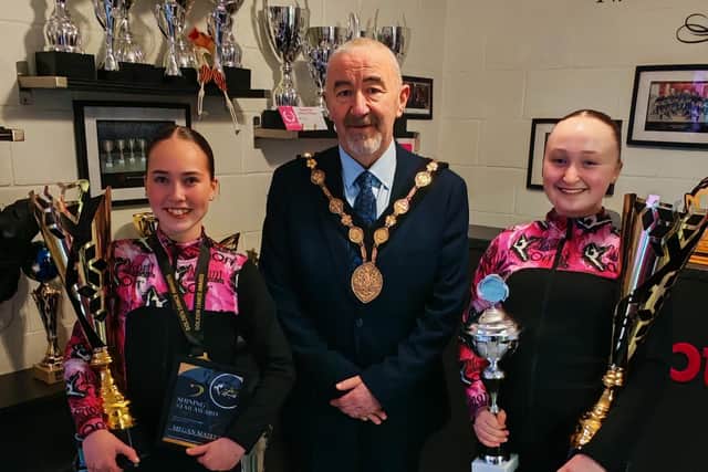 Students from the Naomi Orr School of Dance show off some of the awards won by the dancers to Mayor Brian Higginson. Pic credit: NOSOD