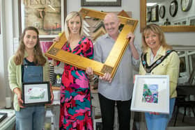 You've been framed...Upper Bann MP, Carla Lockhart and Lord Mayor of ABC Council, Alderman Margaret Tinsley  turned up to celebrate with Jim Laverty on the fifth anniversary of the opening of his picture framing shop, Portadown Framing on Friday. Also included is local artist Julie Kane, left. PT21-261.  Picture: Tony Hendron