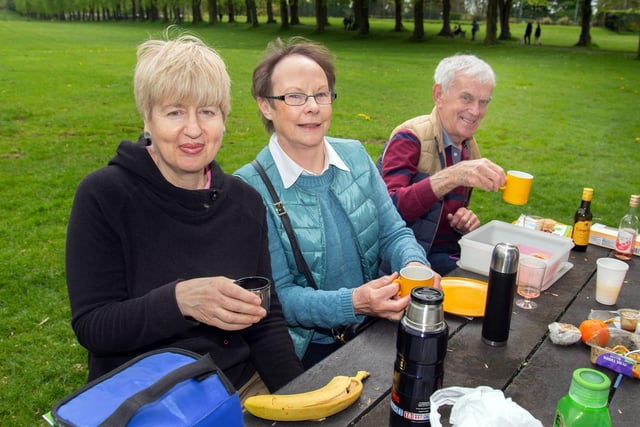 Time for tea at the Shankill Parish Picnic In The Park. Pictured are from left, Christine Connolly and Margot and Eric Taylor. LM19-205.