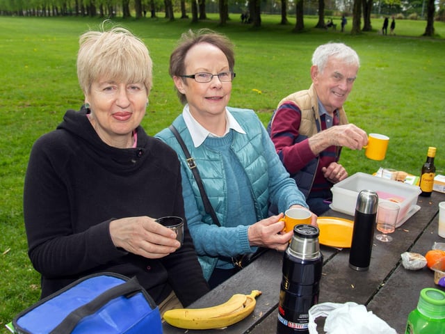 Time for tea at the Shankill Parish Picnic In The Park. Pictured are from left, Christine Connolly and Margot and Eric Taylor. LM19-205.