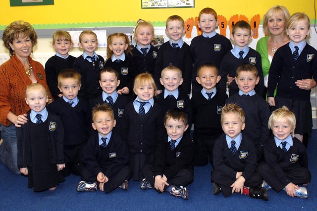 New P1 pupils in 2007 at St John's Primary School, Gilford, pictured with teacher Mrs Patricia Derby, right and Maria McConville, classroom asssistant.