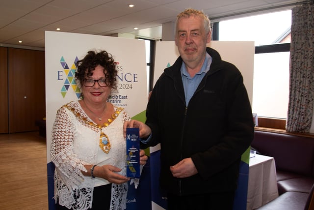 The Business in the Community Award went to Carrick Community Greengrocers. The trophy was presented by Mayor, Gerardine Mulvenna to company representative, Adam Scott. CT17-202.