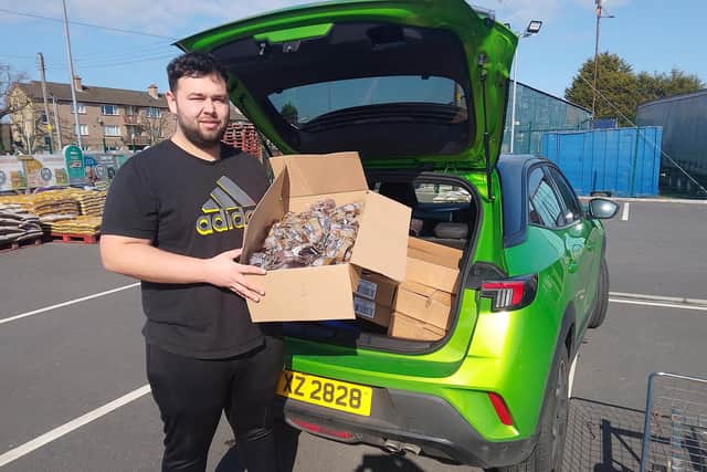 Portadown Wellness Centre is helping the local community through the cost-of-living crisis with the distribution of food, such as these fruit cakes donated by Graham's Bakery. Picture: Portadown Wellness Centre