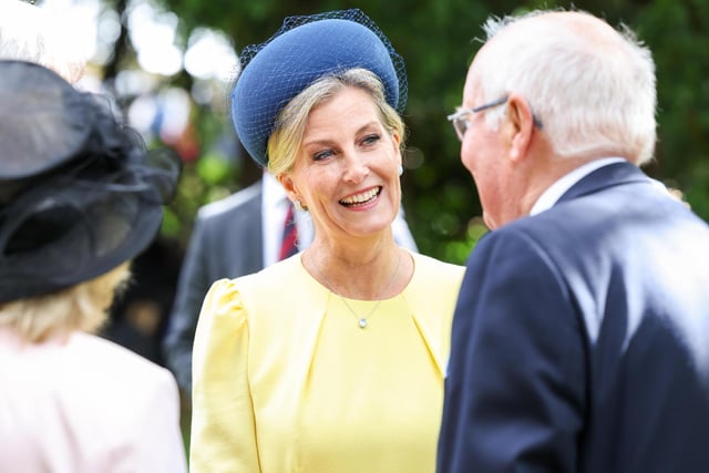 The Duchess of Edinburgh chats with garden party guests at Hillsborough Castle.