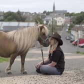 Shauna McFall gets ready to sell her pony at the Ould Lammas Fair. Picture: Steven McAuley / McAuley Multimedia.
