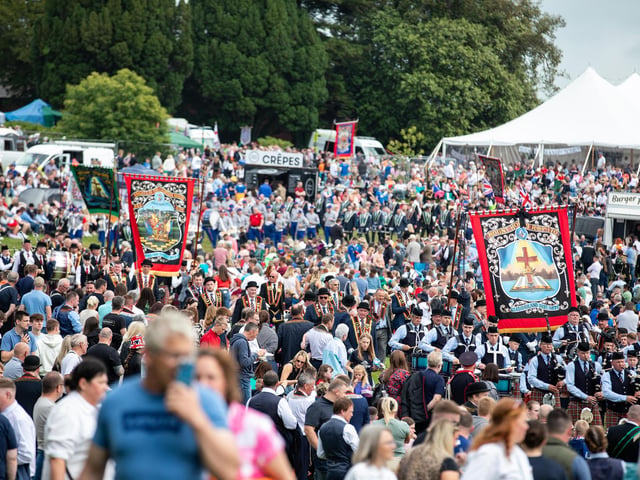 Tens of thousands of visitors converged on the Co Down village of Scarva on Saturday for the annual Sham Fight and parade organised by the Royal Black Institution.