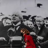 A satirical poster from the group Led By Donkeys depicting Boris Johnson as former British prime minister Neville Chamberlain delivering his “Peace for Our Time” speech in Kentish Town, London (Photo: Justin Setterfield/Getty Images)