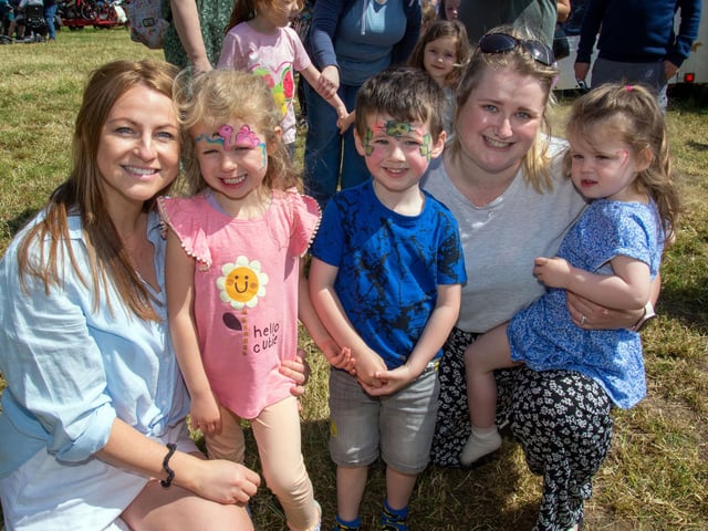Posing happily at the Drumcree Parish Garden Fete on Saturday are from left, Anna O'Brien and daughter, Faye (4), Sullivan Weir ((4), mum, Jessie and sister Addie (2). PT23-227.