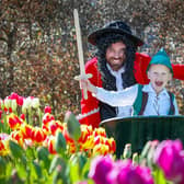 Captain Cook, Will Rainey, and Peter Pan, Elijah Mellon (8), checking out the tulip gardens at Glenarm Castle Estate ahead of the festival.