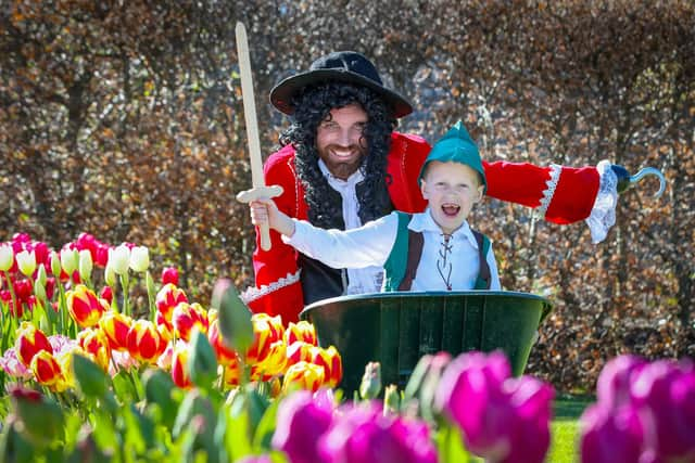 Captain Cook, Will Rainey, and Peter Pan, Elijah Mellon (8), checking out the tulip gardens at Glenarm Castle Estate ahead of the festival.