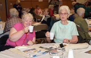 Enjoying a cuppa at the Celebration Event hosted by Mid Ulster Loneliness Network in the Burnavon.