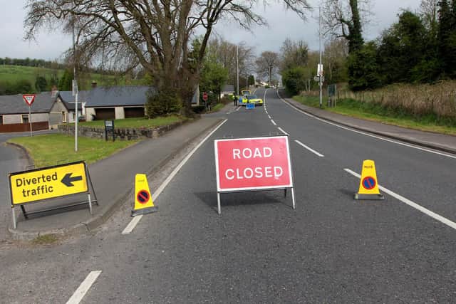 Police at the scene of the collision at Tullyvar Road in Aughnacloy. Picture: Pacemaker