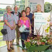 At the launch of Translink Ulster in Bloom 2023 are, from left to right: Yvonne Carlton and David Brown, Brighter Whitehead; the Mayor of Mid and East Antrim  Ald Gerardine Mulvennal;  Lindsay Houston, Mid and East Antrim Council; Marie Mallon OBE, Translink non-executive director; Cllr Billy Webb MBE, vice president of NILGA Vice and Alex Carmichael, Mid and East Antrim Council. Credit: Aaron McCracken
