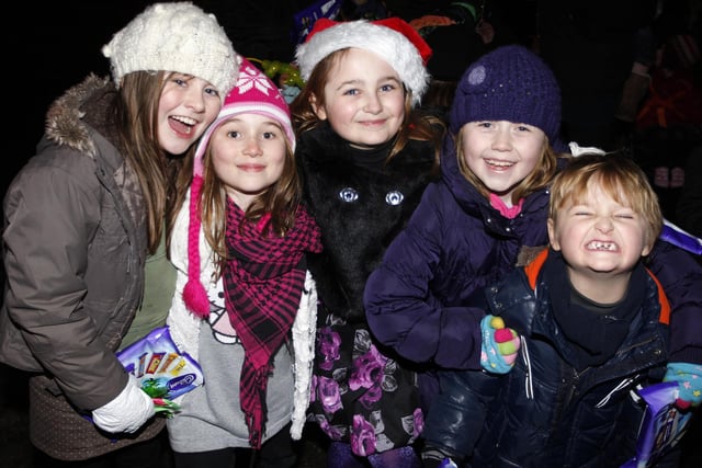 These children are happy after meeting Santa at the switch on of the Christmas Lights in Portstewart in 2010