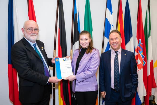 Loreto College student  Caitlyn Bullock receiving her Rotary Youth Leadership Development award from Capt. Sean Fitzgerald, District Governor of Rotary Ireland and Patrick O’Riordan, Head of Public Affairs with the European Parliament in Ireland,  at an event at Europe House in Dublin recently. [Photo: Collette Creative Photography]