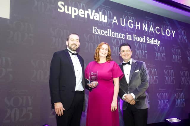 Accepting the LRQA award which recognises the highest standards in food quality and safety on behalf of SuperValu Daly’s Aughnacloy is SuperValu regional manager Colum Durey who is joined by Joanne Bertenshaw from Musgrave’s Food Quality and Safety Team and awards host Pete Snodden.