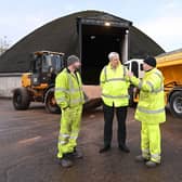 Infrastructure Minister John O’Dowd launches the winter service with gritter drivers Neil Norrie and Stuart Tate.. Picture: Michael Cooper