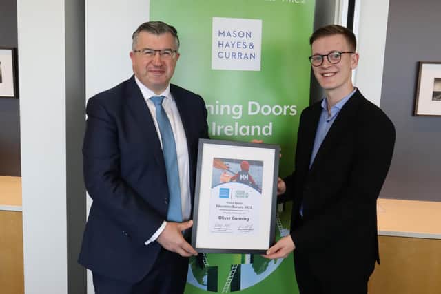 Oliver Gunning being presented with his award by Will Carmody, managing partner with Mason Hayes & Curran. Photo submitted by Vision Sports Ireland.