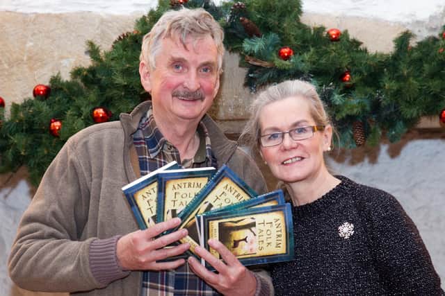 Pictured in 2014 were Billy Teare and Kathleen O'Sullivan with their book Antrim Folk Tales. Photo: RM Studios