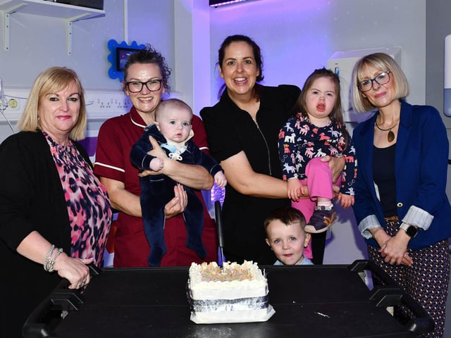 Alison Cook, Caroline Quinn, Fiona O'Neill with her children Caolin, Gracie and Oisin, and Jane Colville pictured at the opening of the new sensory room. CREDIT NHSCT