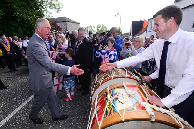 The then Prince of Wales greets Lambeg drummers during a visit to Sloan's House Museum of Orange Heritage in Loughgall in 2016. Picture: Arthur Allison / Pacemaker.