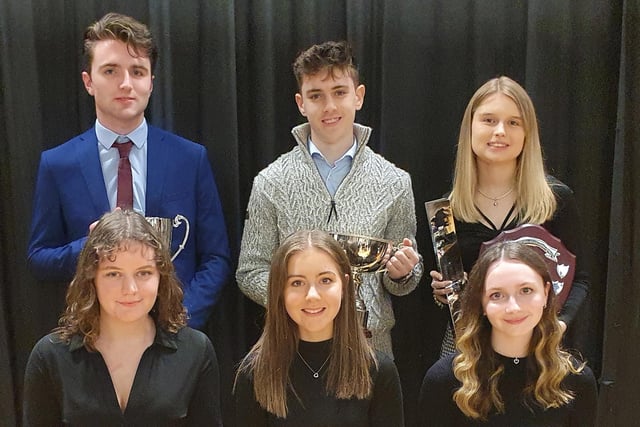 Year 14 Prize Winners: Back Row L-R Simon Kinnen -The Matthews Cup for the Boy contributing most to the School, Andrew Richardson - The Norman Emerson and Sons Cup for A Level Business Studies, Sarah Gardiner - The Kris Turnbull Innovation in Art Award. Front Row L-R Sarah Slaine - The Wylie Perpetual Cup for Musical Endeavour, Jessie Millar The Errol McCreedy Cup for A Level Religious Studies, Lauren Young - The Knox Cup for A Level Health  and Social Care.