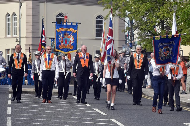 The head of the Portadown Junior LOL parade makes its way through the town before heading off to Bangor on Saturday morning. PT22-225.