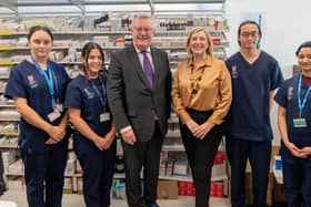 Health Minister Mike Nesbitt with Cathy Harrison (Chief Pharmaceutical Officer) and Pharmacy Students from Queen’s University and Ulster University. Pic credit: SEHSCT
