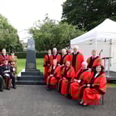 His Majesty’s Lord Lieutenant of Co Antrim, Mr David McCorkell KstJ; Mayor of Antrim and Newtownabbey, Cllr Mark Cooper BEM, High Sheriff of Co Antrim, Mr Peter Mackie DL; Assistant Chief Constable of the PSNI, Mr Ryan Henderson and Chief Executive for Antrim and Newtownabbey Council, Mrs Jacqui Dixon MBE are joined by Elected Members at the dedication of the RUC George Cross Memorial in Ballyclare War Memorial Park. (Pic:Kelvin Boyes).