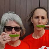 To coincide with Christian Aid Week (14-20 May), Stoneyford women Norma Parker (left) and Zelda Hearst shared a photo with a pea pod in place of their normal smiles to demonstrate their happiness for pigeon pea farmers in southern Malawi who have seen their lives transformed since joining Christian Aid-supported cooperatives.