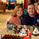Admiring some of the Lego models are the Macartney family including mum Rachel, dad Michael and Jesse (5). PT17-220.