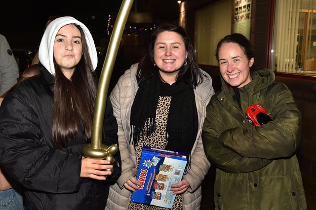 Happy Faces...Getting into the festive spirit at the Christmas lights switch on at the Mayfair Business Centre, Garvaghy Road, are fro left, Cara Weir, Claire Murphy and Amy Weir. PT50-255.