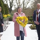 In 2021 the then mayoral team of Antrim and Newtownabbey Council, presented Brenda Doherty with a floral wreath in remembrance of all those who lost their lives during the pandemic.