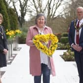 In 2021 the then mayoral team of Antrim and Newtownabbey Council, presented Brenda Doherty with a floral wreath in remembrance of all those who lost their lives during the pandemic.