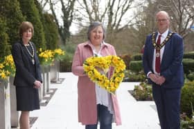 In 2021 the then mayoral team of Antrim and Newtownabbey Council, presented Brenda Doherty with a floral wreath in remembrance of all those who lost their lives during the pandemic.