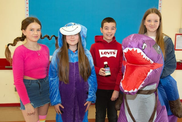 Ballyoran Primary School P7 pupils dressed as their favourite book characters for World Book Day. Included from left are, Sophia, Beth, Jamie and Tia. PT10-251.