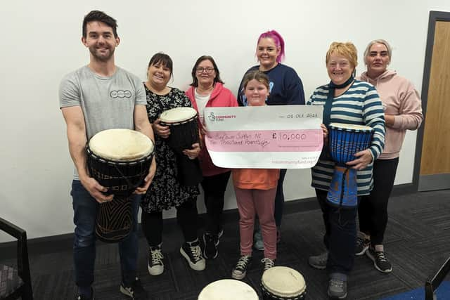 Members of Sunflower Support NI celebrating their funding success. Credit: National Lottery